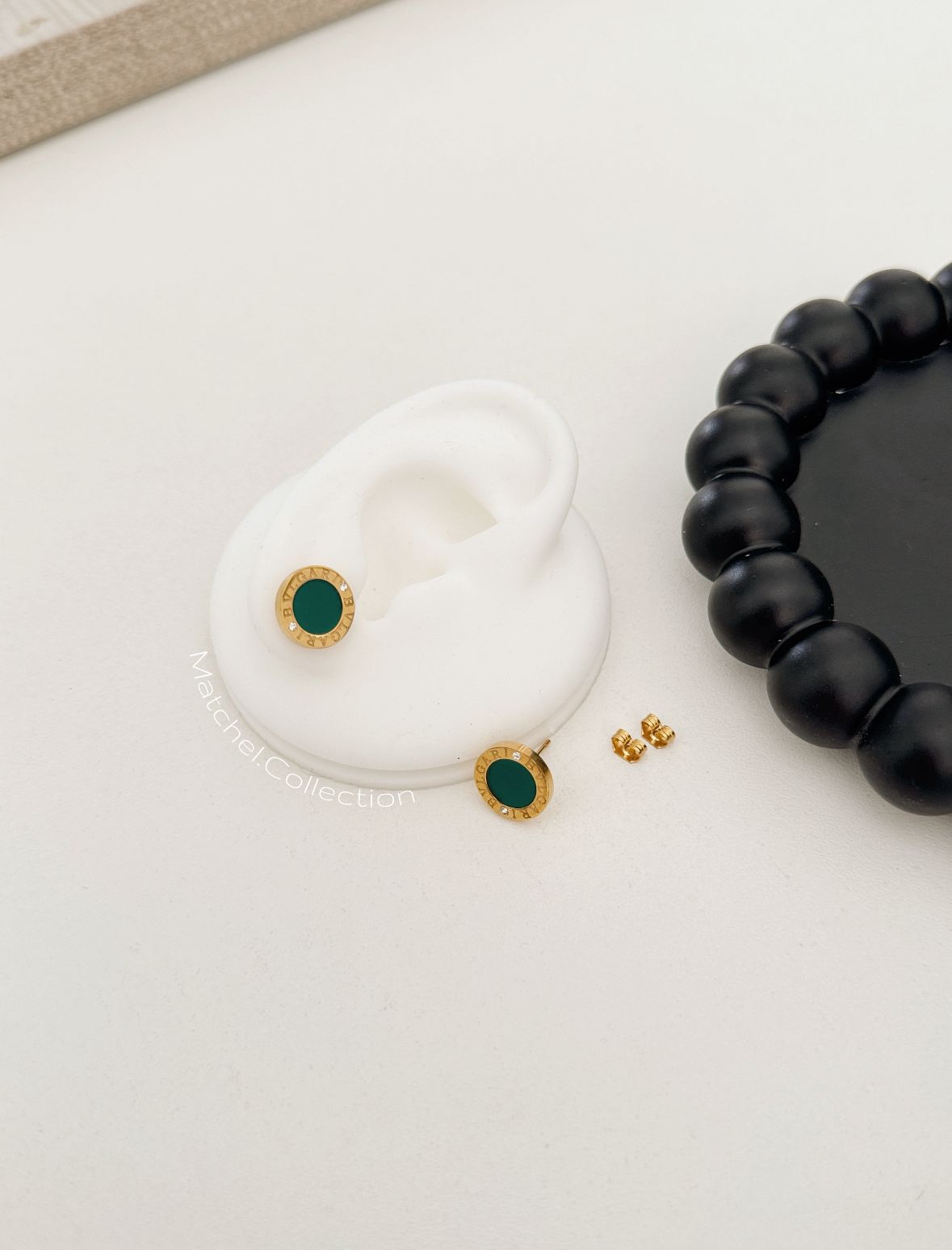 Aros dorados con verde