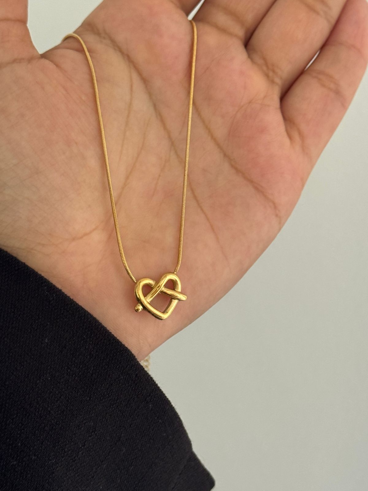 Collar de corazon tejido