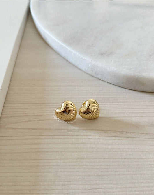 Aros dorados de corazon